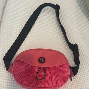 Hot pink and black Lululemon crossbody